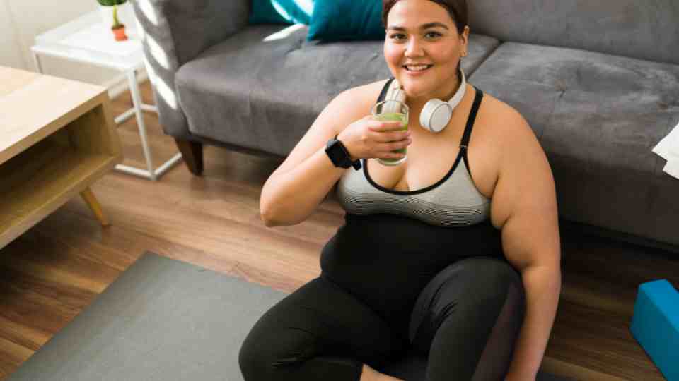 Woman happily losing weight